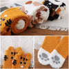 Chaussettes pelucheuses patte de chat