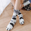 Chaussettes pelucheuses patte de chat