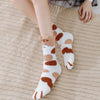 Chaussettes pelucheuses patte de chat