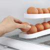 Boîte de rangement automatique pour porte-œufs à défilement