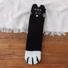 Chaussettes pelucheuses patte de chat