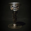 Sculpture de visage de crâne de piston