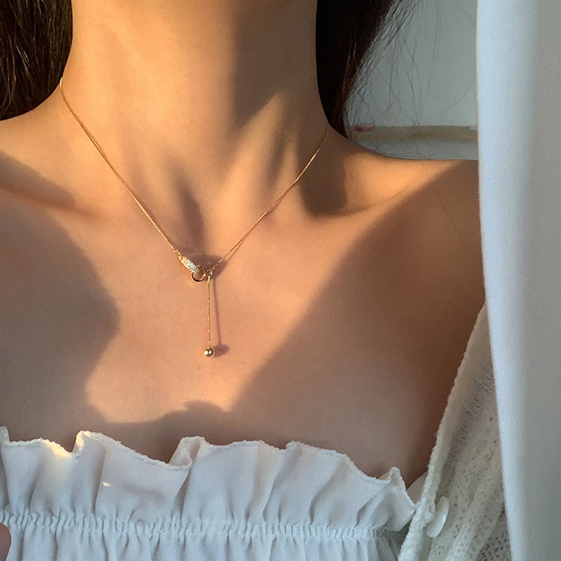 Collier double anneau perle et diamants